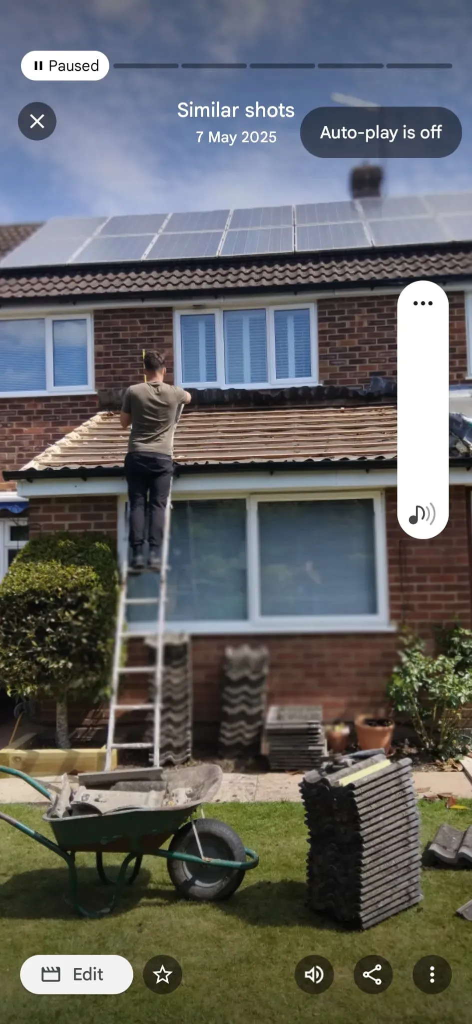 Roofer carrying out tiled roof repairs and batten preparation on a residential house extension