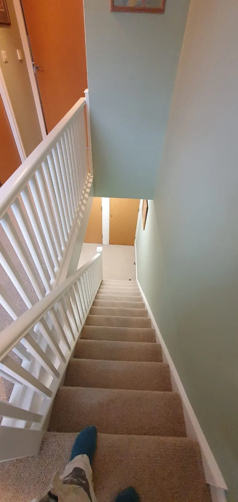 Interior painting and decorating of a residential staircase and hallway in Felixstowe.