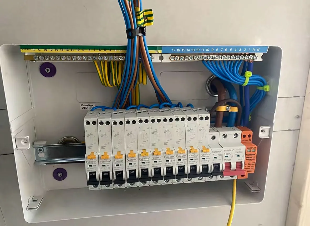 Modern 18th Edition metal-clad RCBO consumer unit with surge protection installed by Sussex Brown Sparks