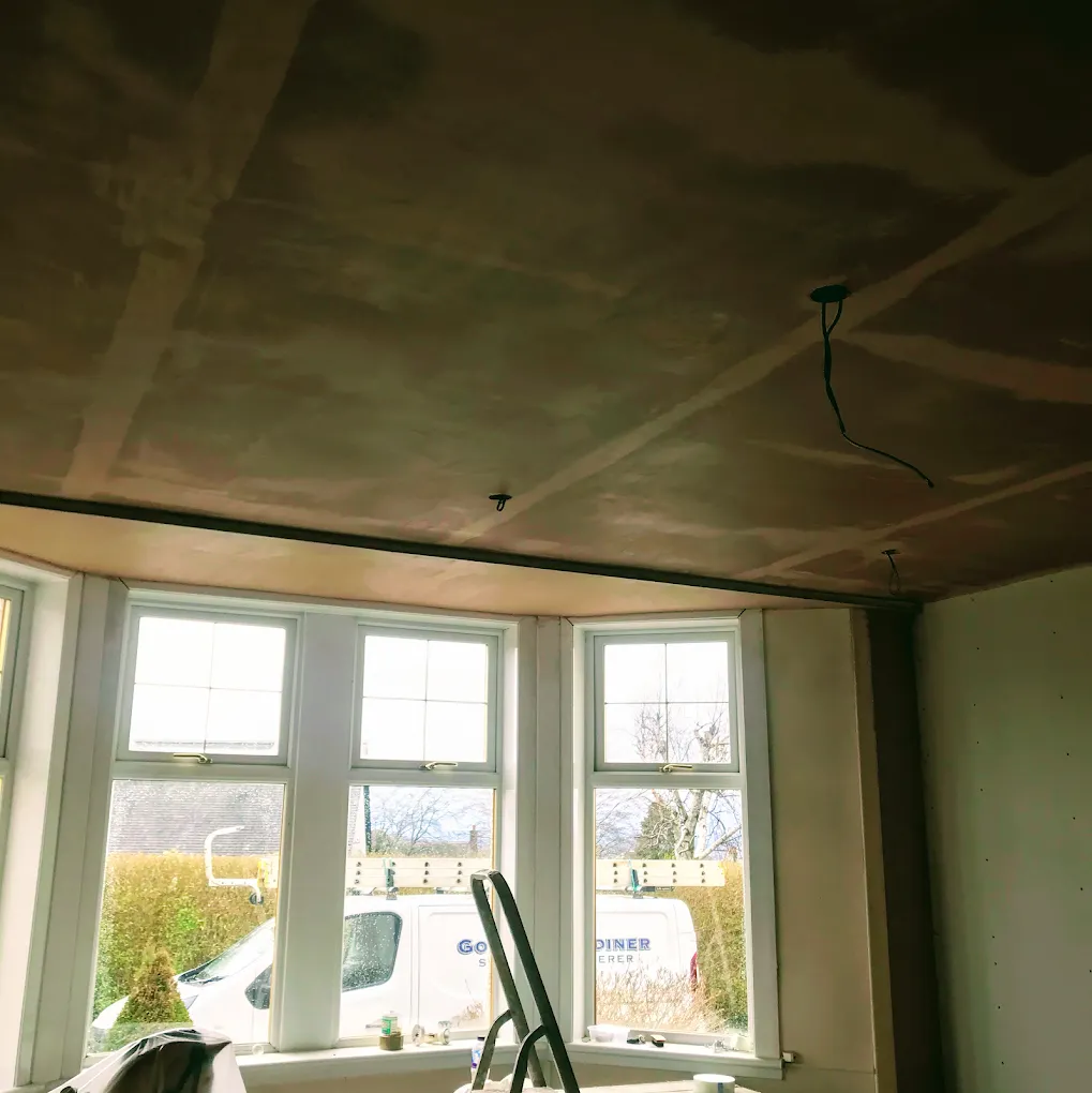 A freshly plastered ceiling during a home renovation project by Gordon Gardiner Slater & Plasterer