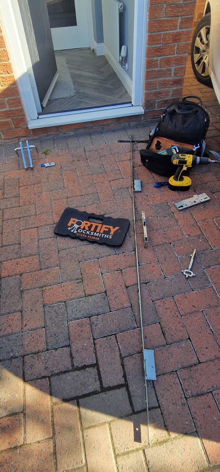 Fortify Locksmiths tools and a multi-point lock mechanism ready for a uPVC door repair service