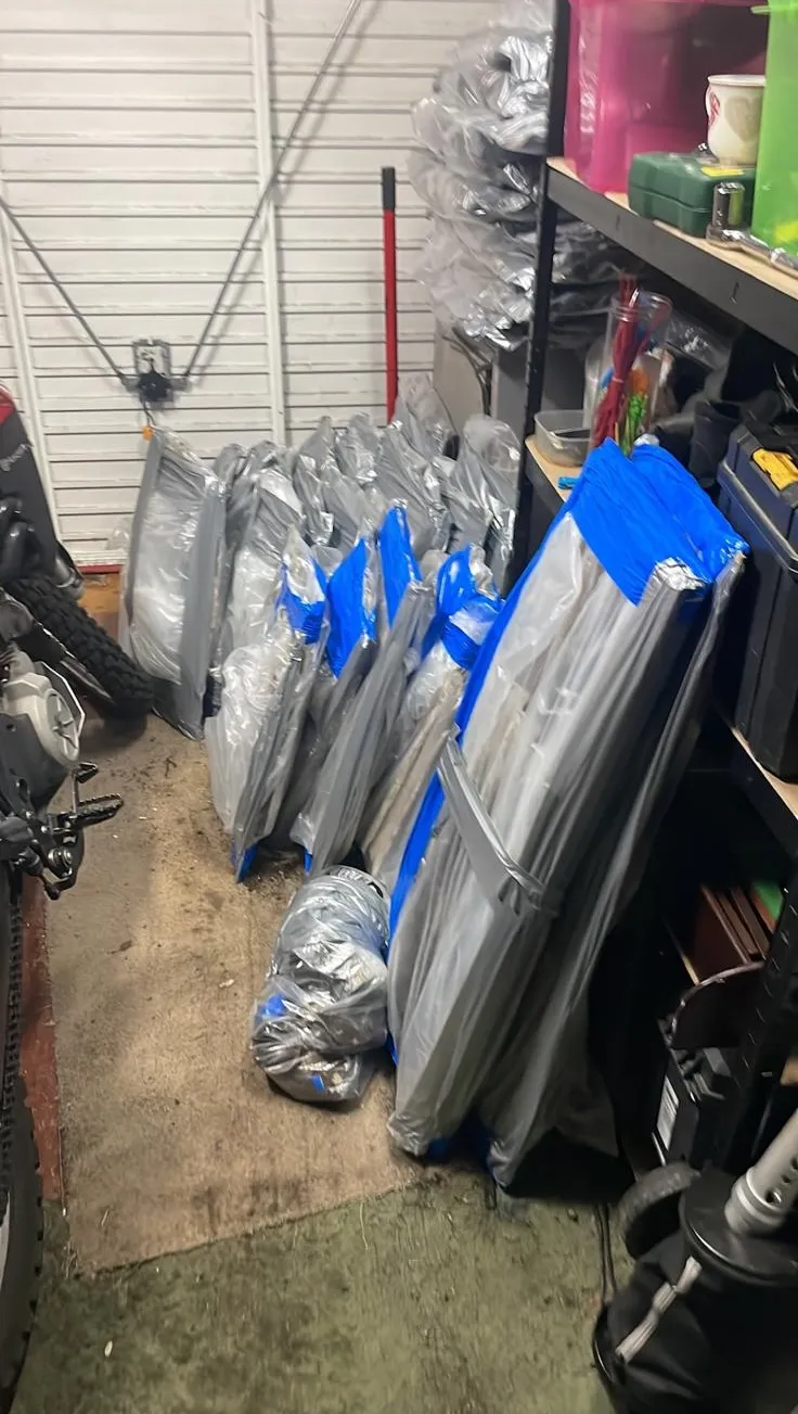 Securely wrapped asbestos waste prepared for disposal by Stay Safe Environmental.