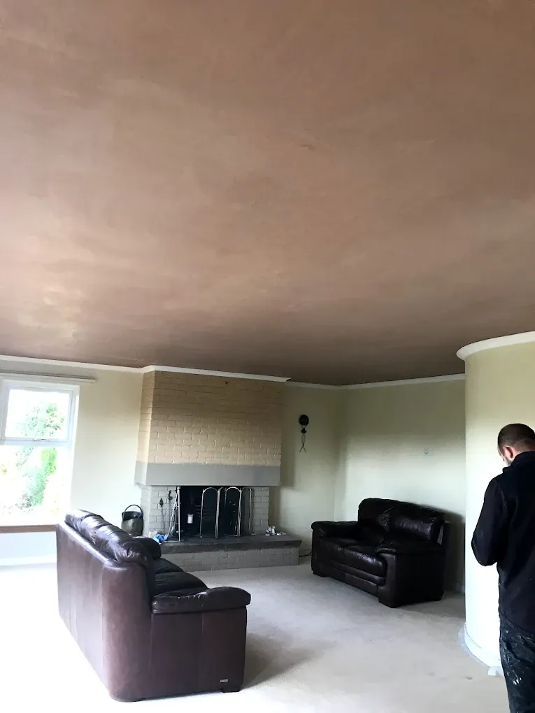 Professional ceiling plastering in a living room by Gordon Gardiner Slater & Plasterer in Lanark.