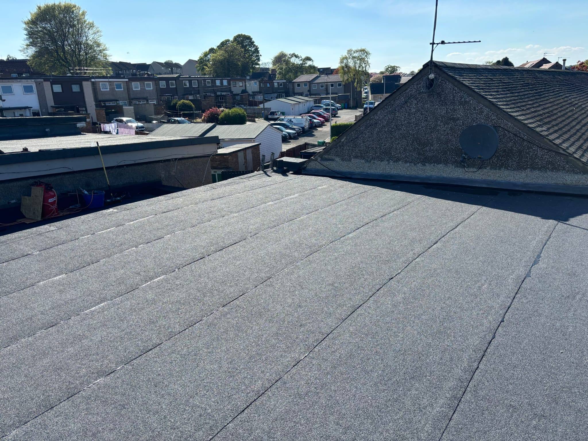 A picture of a newly installed flat roof by RM & SON ROOFING & PROPERTY CARE on a residential property in Kirkcaldy