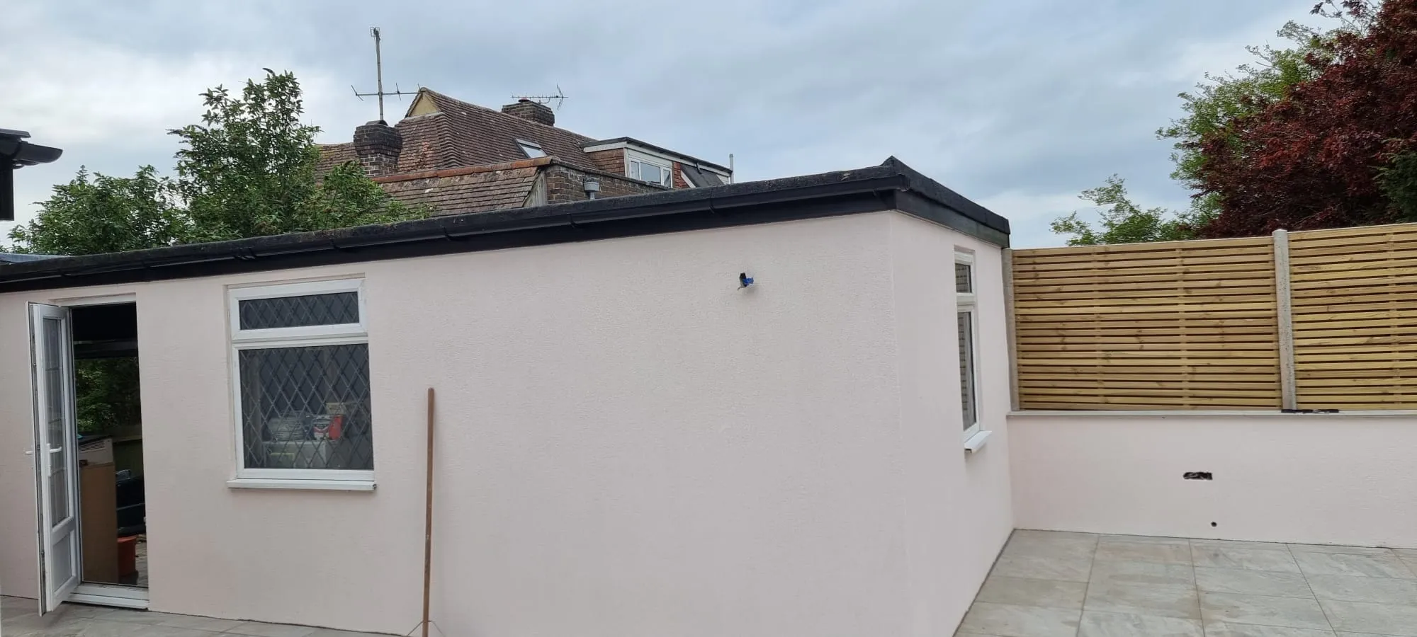 High-quality external rendering on a residential extension in Southwick by Portslade Plastering.
