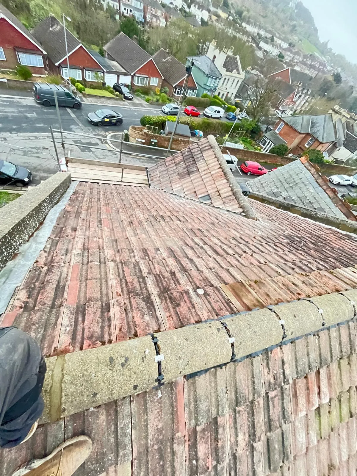 Dry ridge system installation on a tiled roof by First Choice Roofing Kent in West Malling