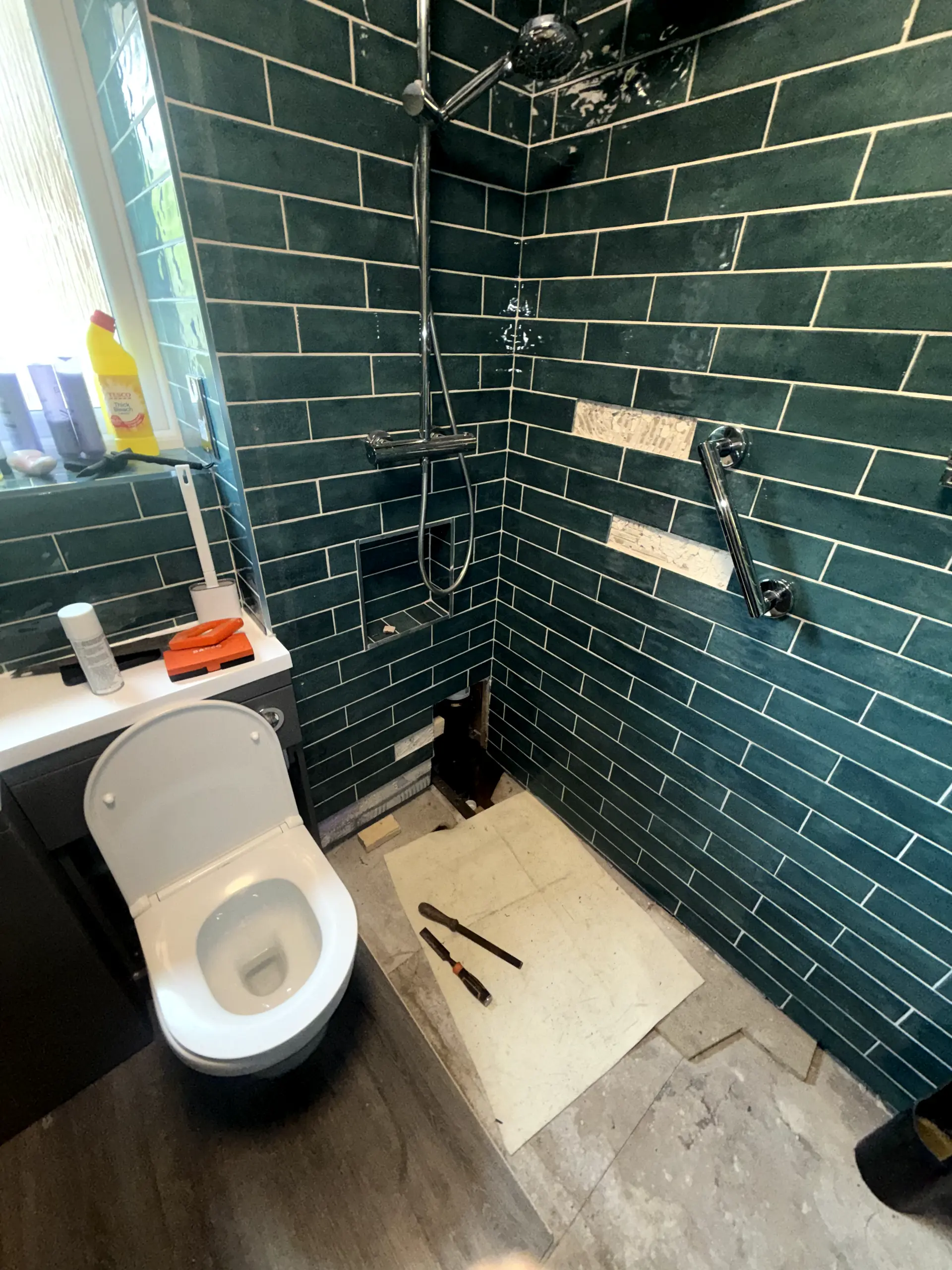 Expert plumbing repairs and leak detection in a Darwen home by WGS Services.