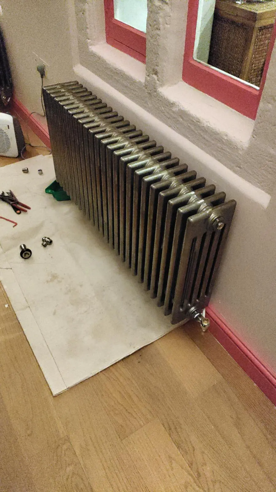 Professional radiator installation and repair in progress by BC Plumbing