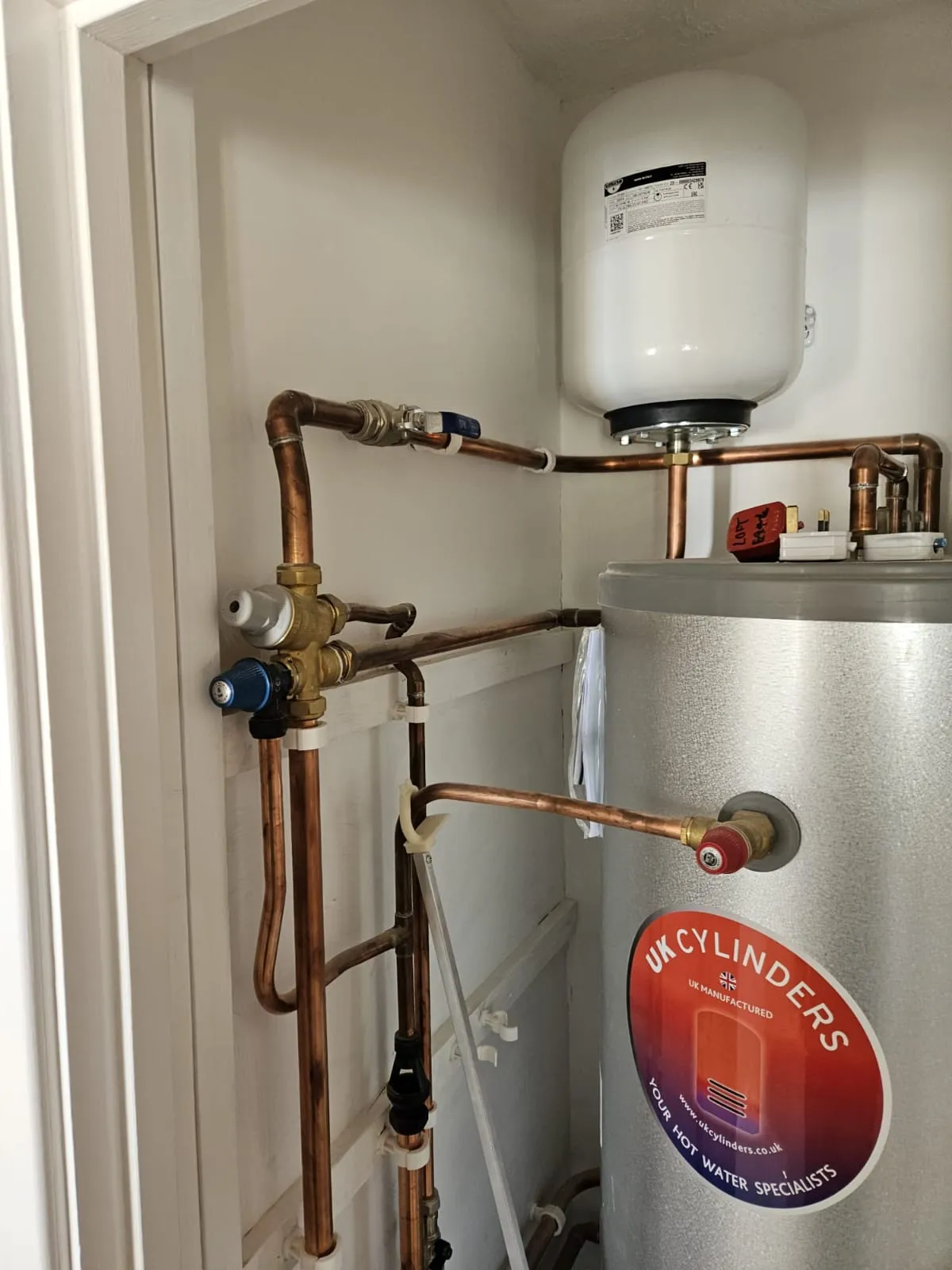 Professional unvented hot water cylinder installation by FLEX PROPERTY SERVICES in Felixstowe.