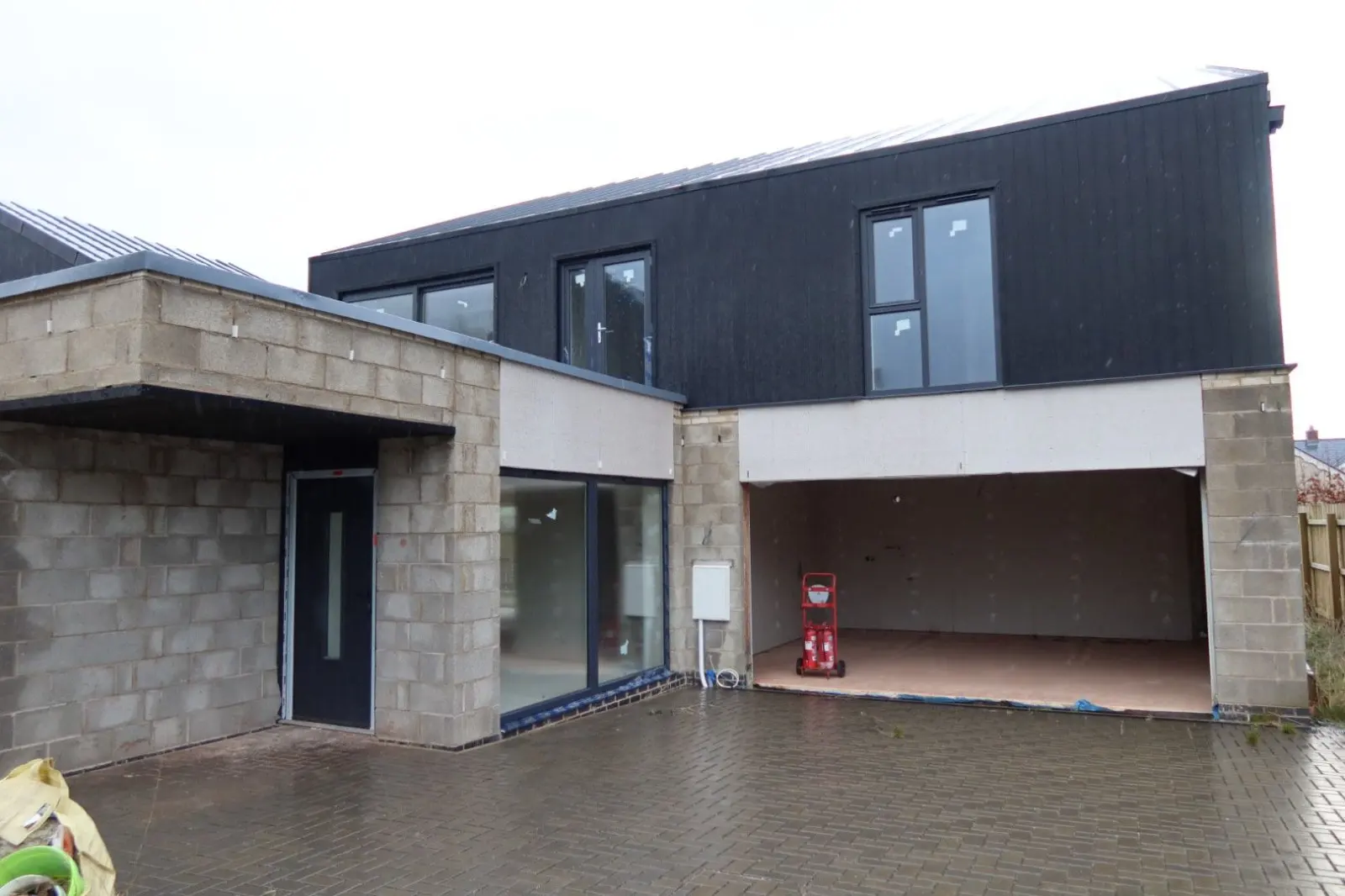 Modern new build property with exposed concrete blocks ready for external rendering