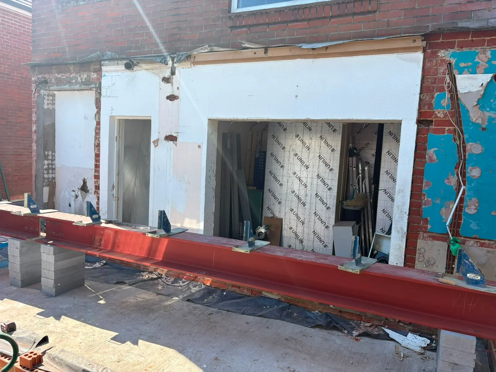Structural RSJ steel beam prepared for installation during a house alteration