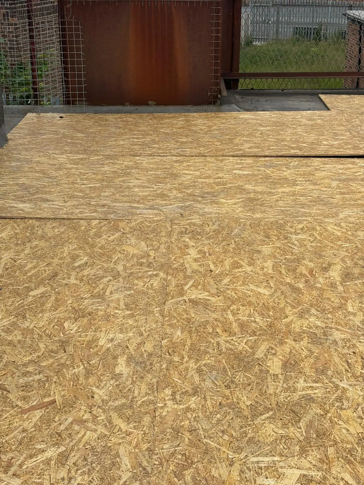 OSB timber boards laid down forming the base for a new flat roof