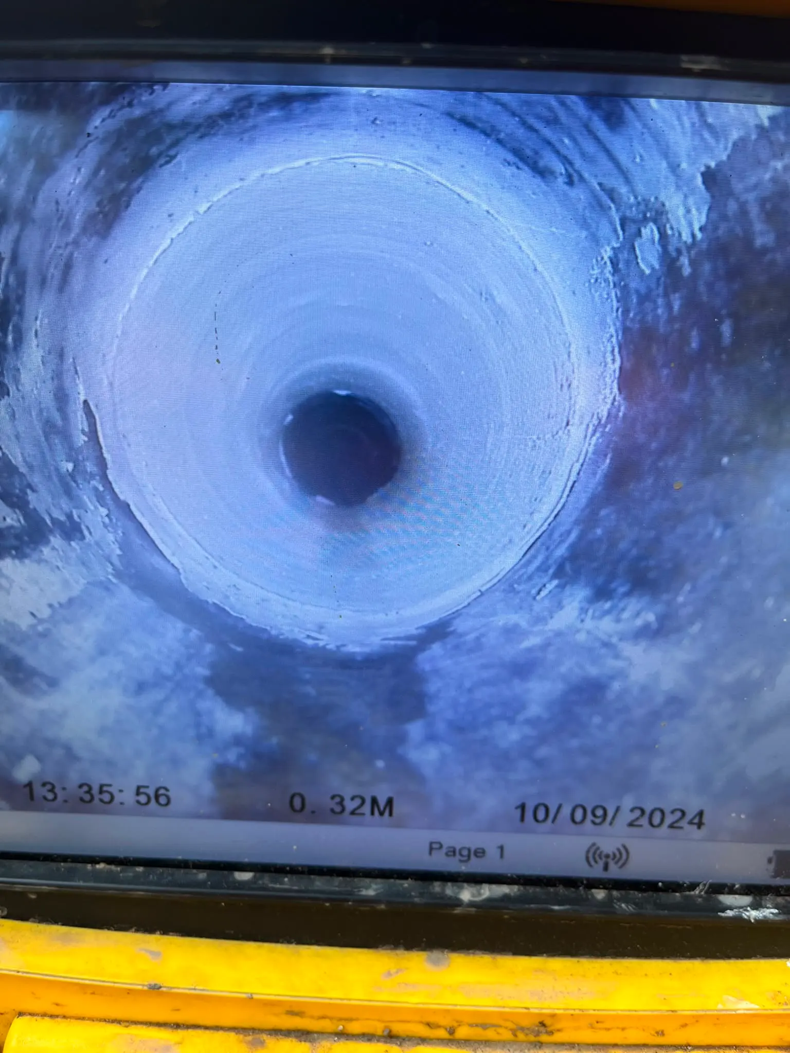 Live CCTV drain survey monitor showing the inside of a pipe during an inspection by CB Drainage in Alloa