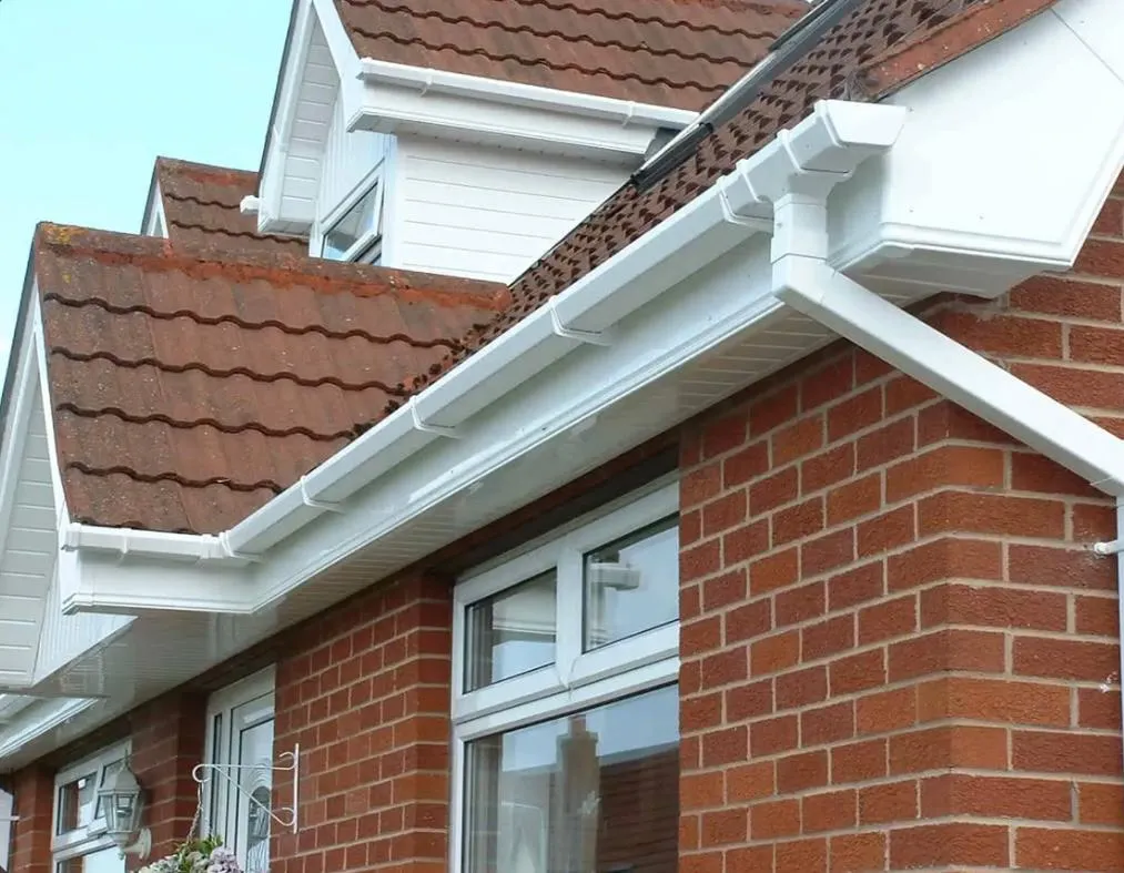 Close-up of newly installed white uPVC fascias, soffits, and guttering by Sky Top Roofing LTD
