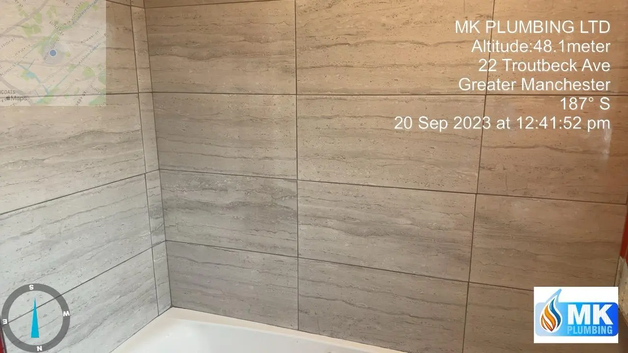 High-quality bathroom wall tiling and bath installation by MK Plumbing LTD experts.