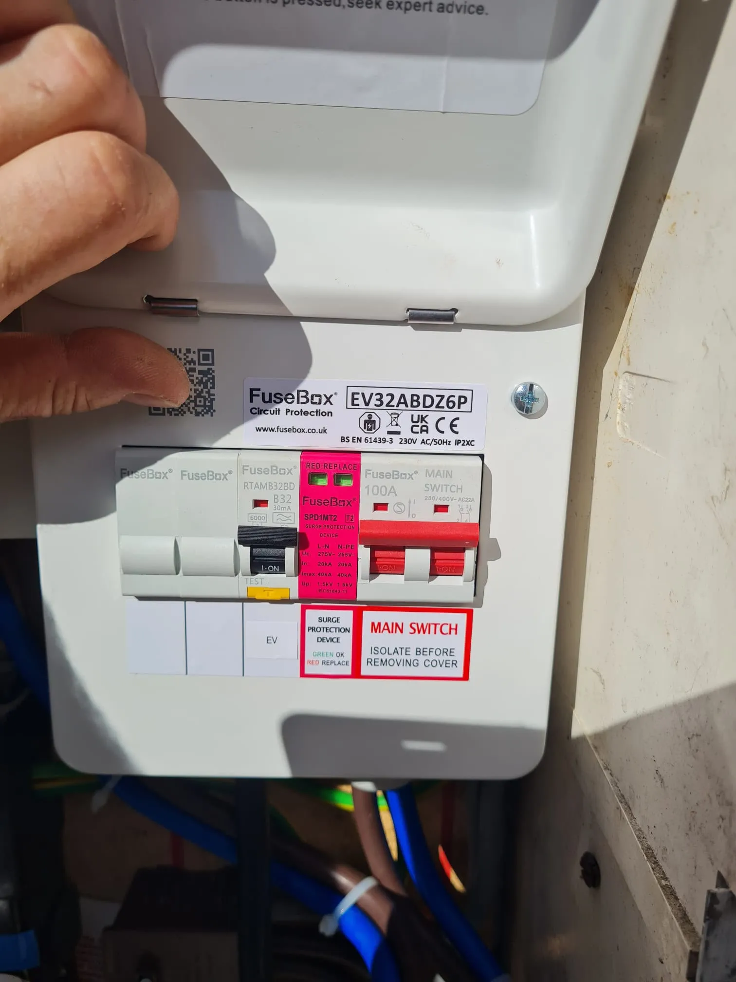 Dedicated EV charger consumer unit with integrated surge protection device installed by Sussex Brown Sparks