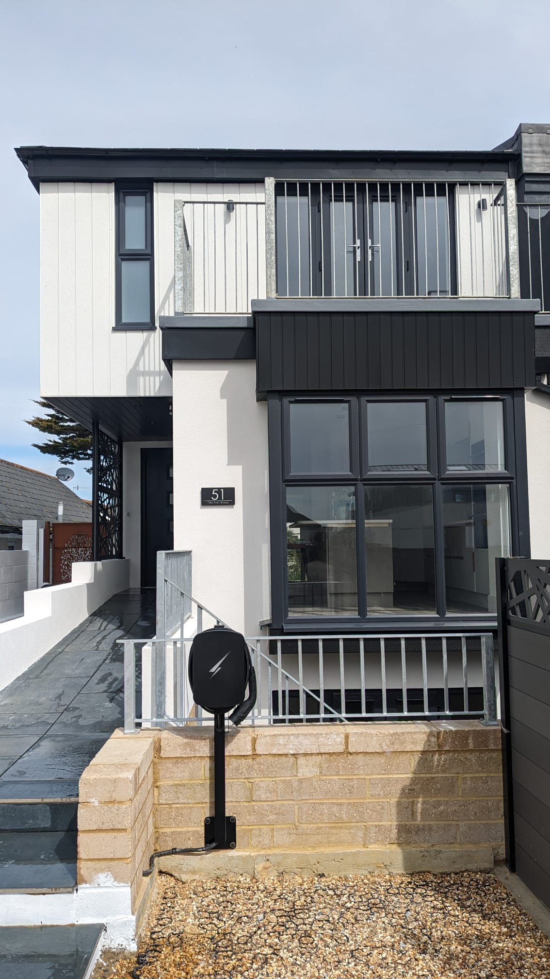 Modern house with professionally applied white external rendering