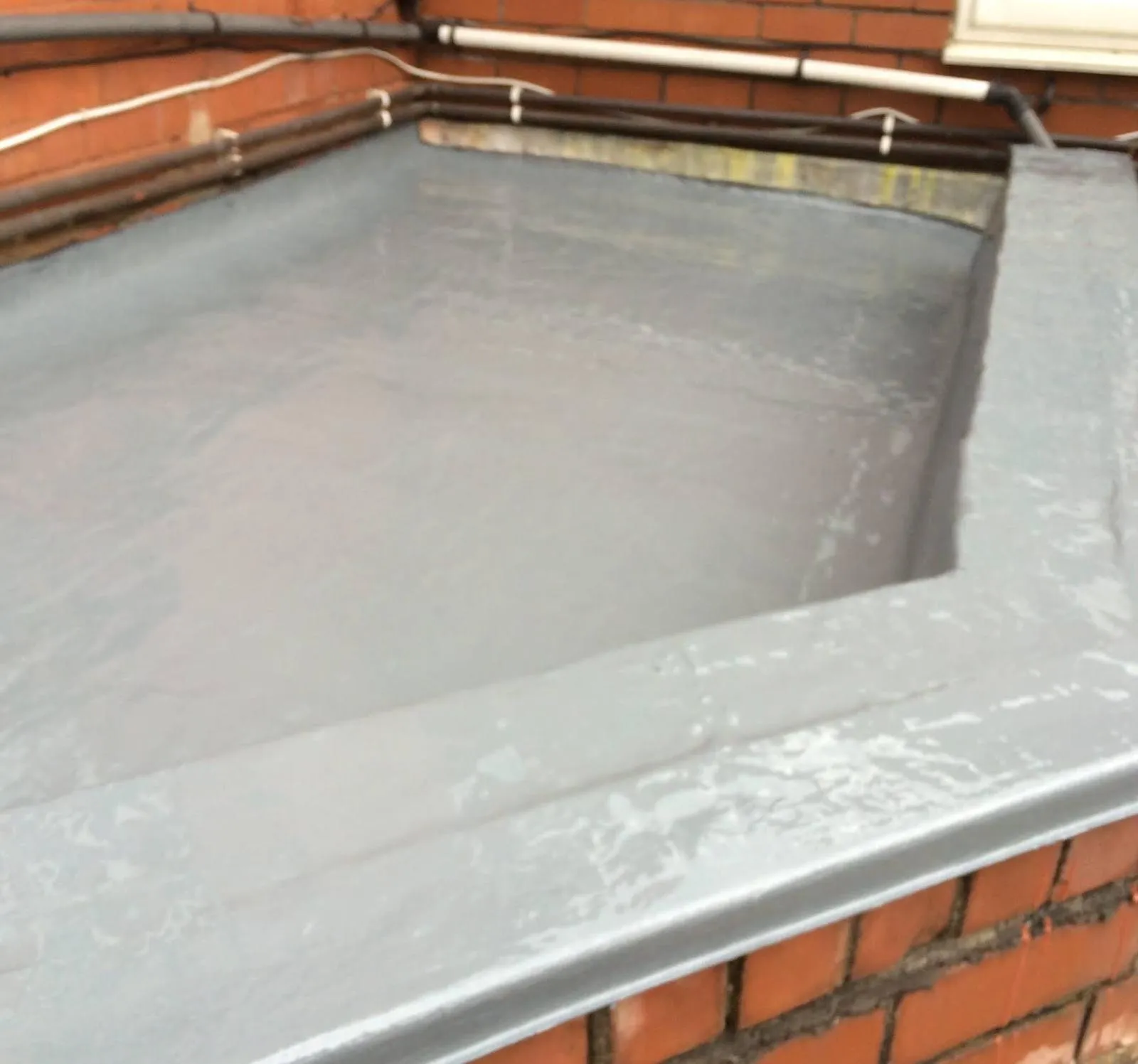 Modern grey flat roof replacement in Aylesbury