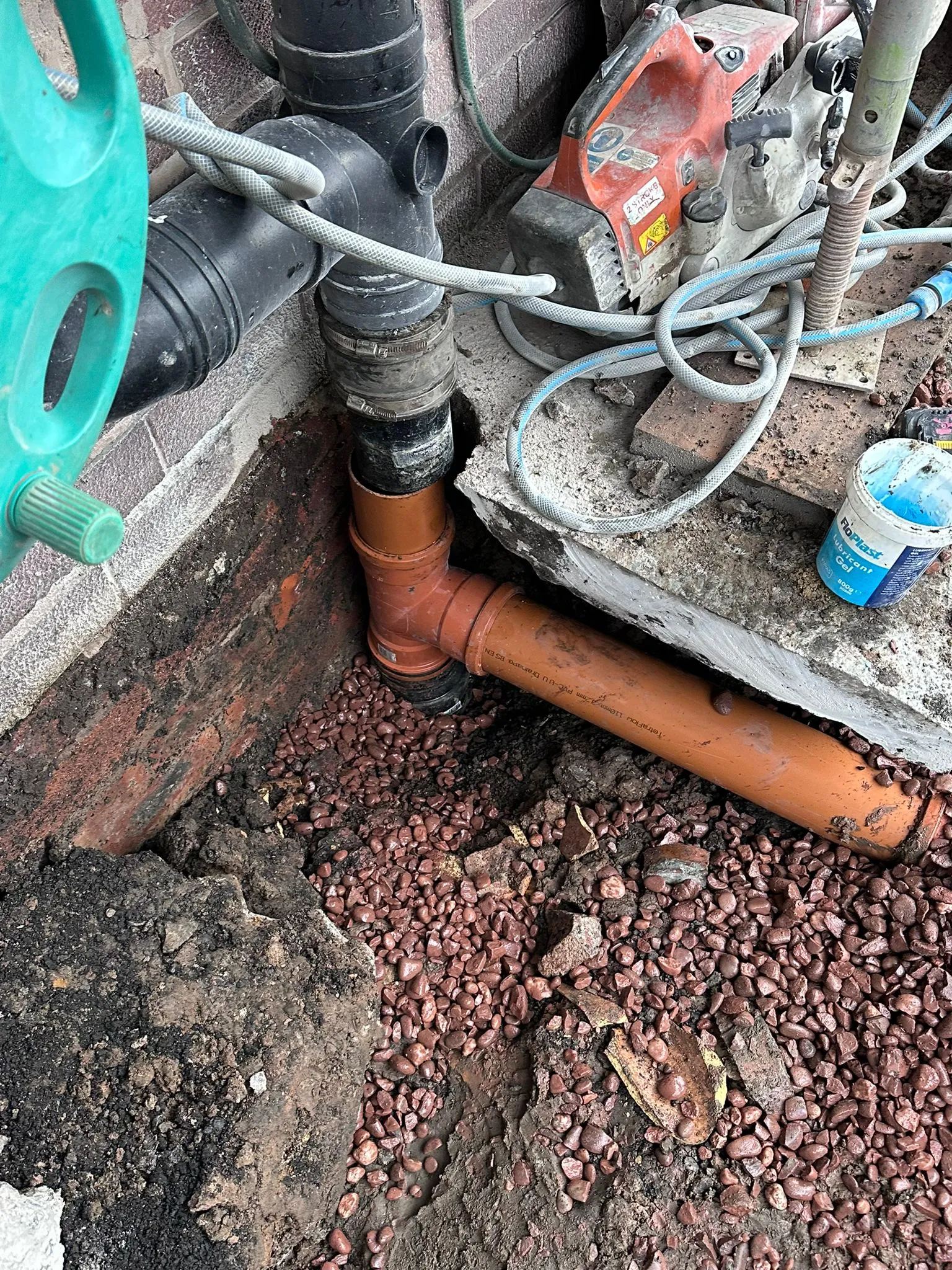 Underground drainage pipe repair and installation work in Macclesfield