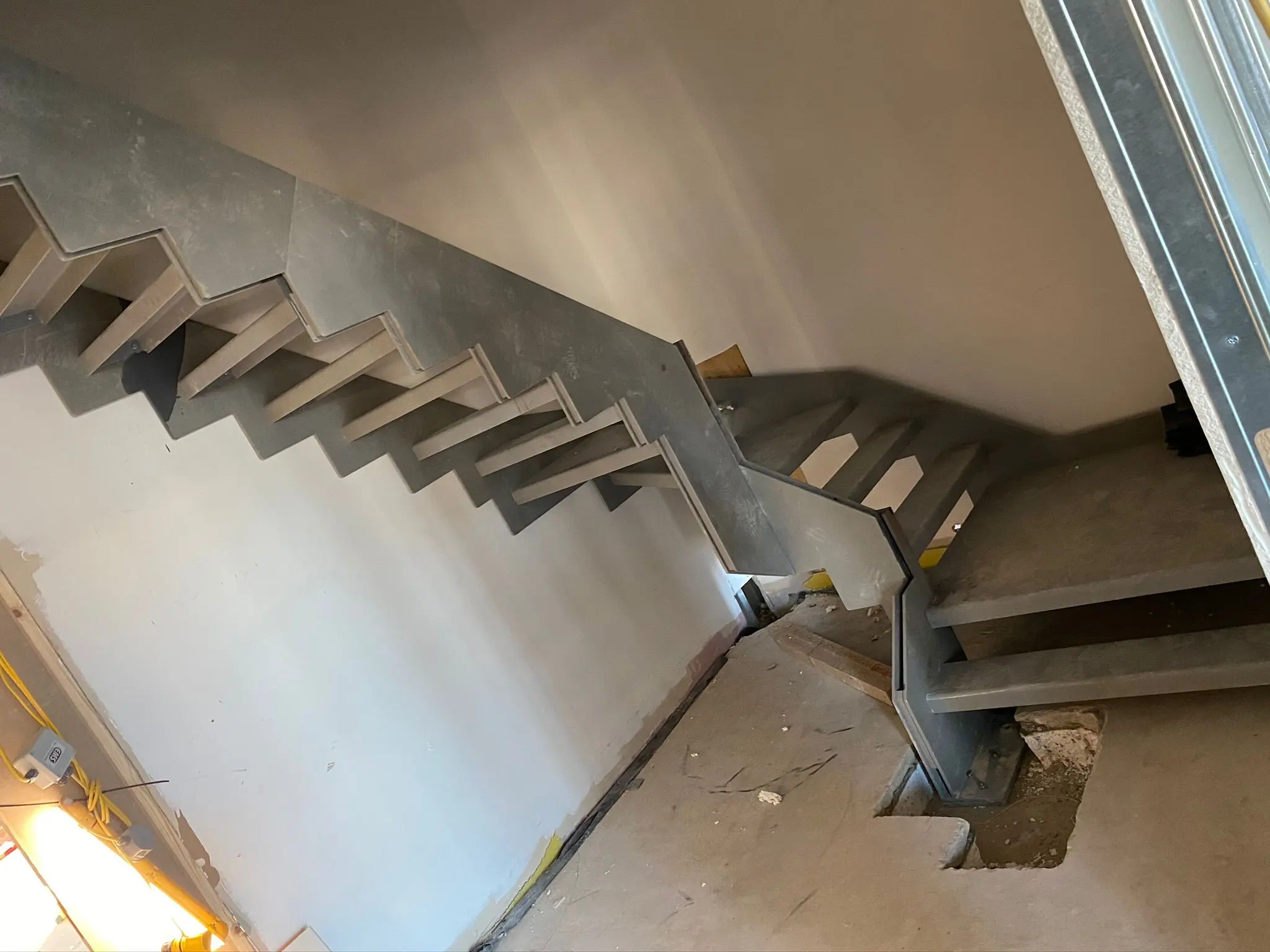 Heavy-duty steel staircase installation in a commercial building