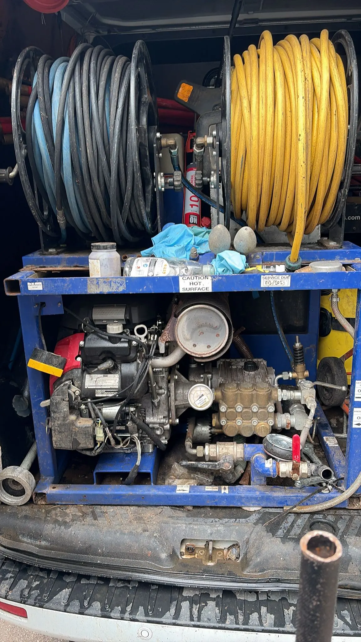 Professional high-pressure drain jetting equipment for clearing stubborn blockages.