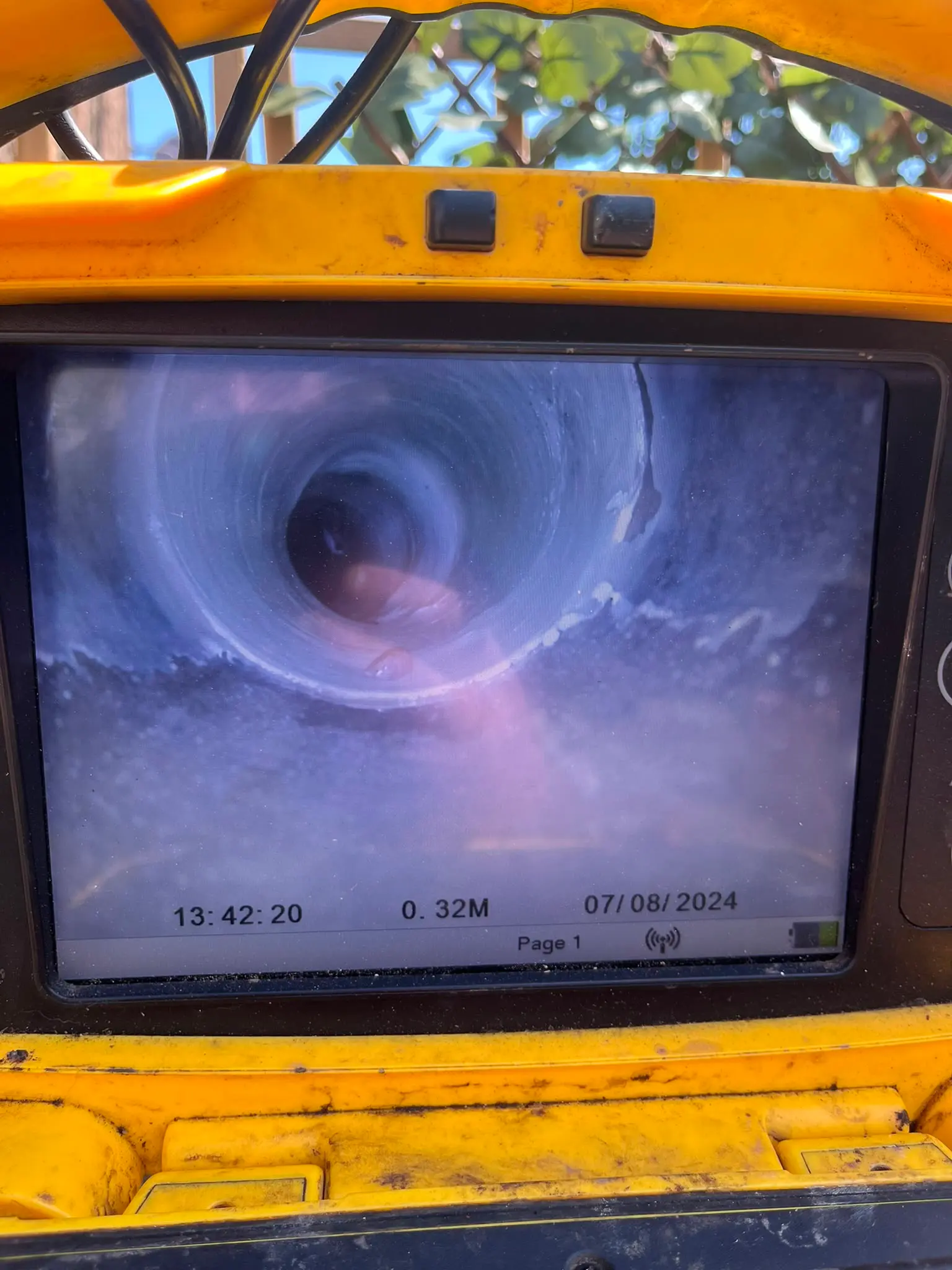 CCTV drain survey monitor showing the internal condition of a drain pipe during a professional inspection by CB Drainage in Alloa