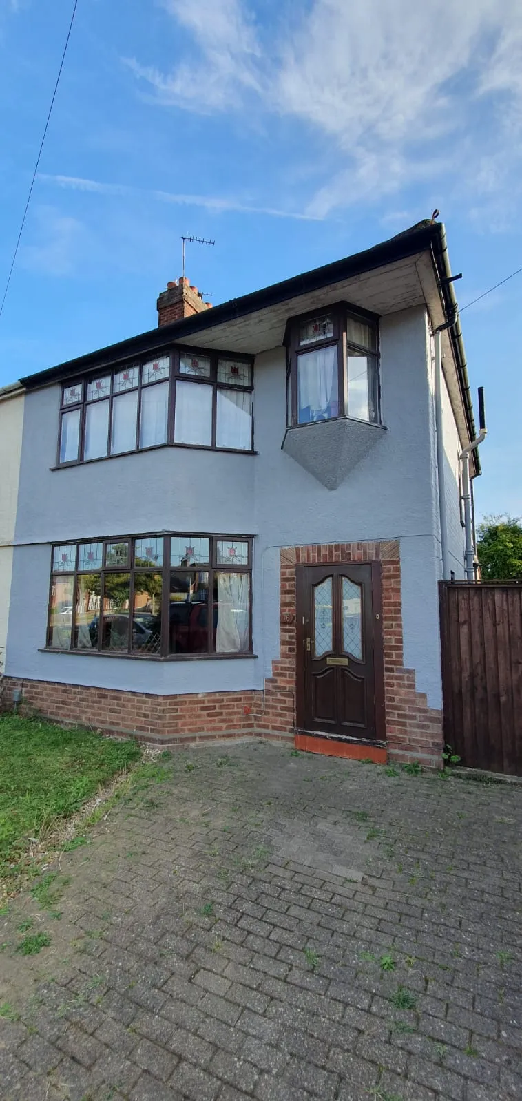 Professional exterior painting and decorating for a residential property in Suffolk by FLEX PROPERTY SERVICES.