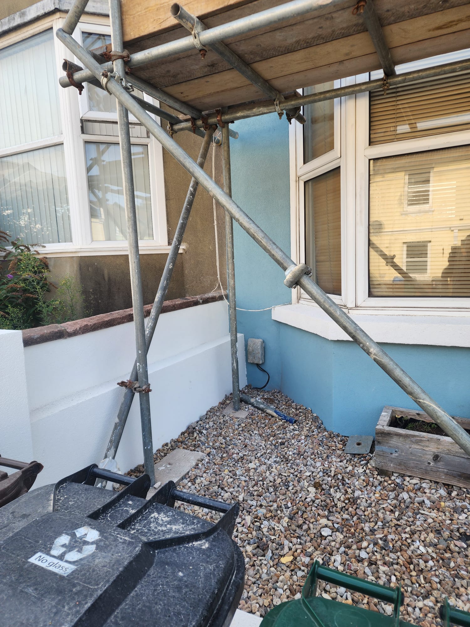 Scaffolding set up for external rendering work on a house in Portslade.
