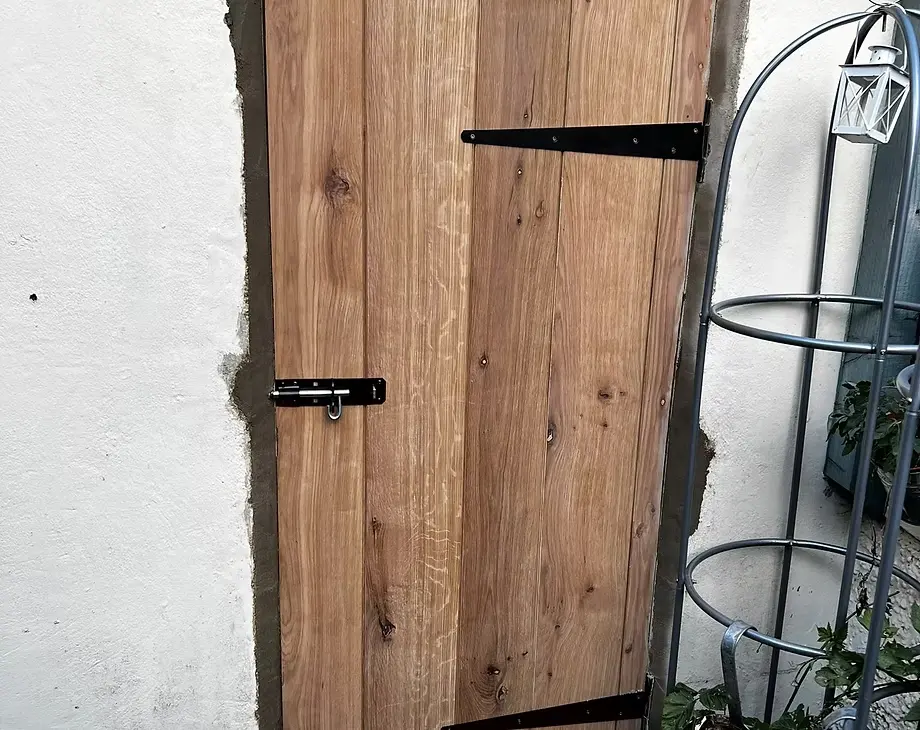 Newly fitted exterior wooden door.