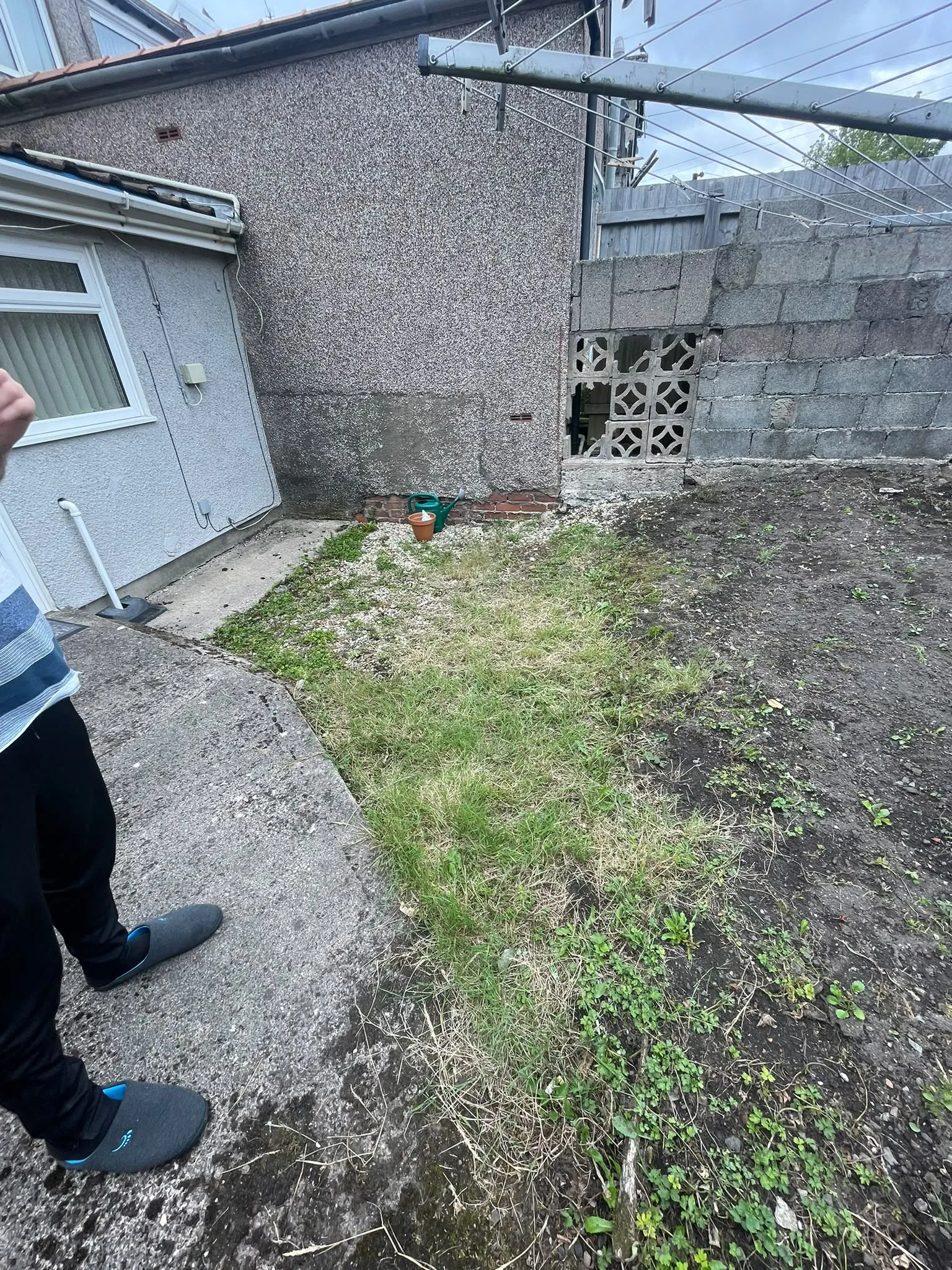 Untidy domestic garden area in need of garden clearance and ground preparation in Pontypool