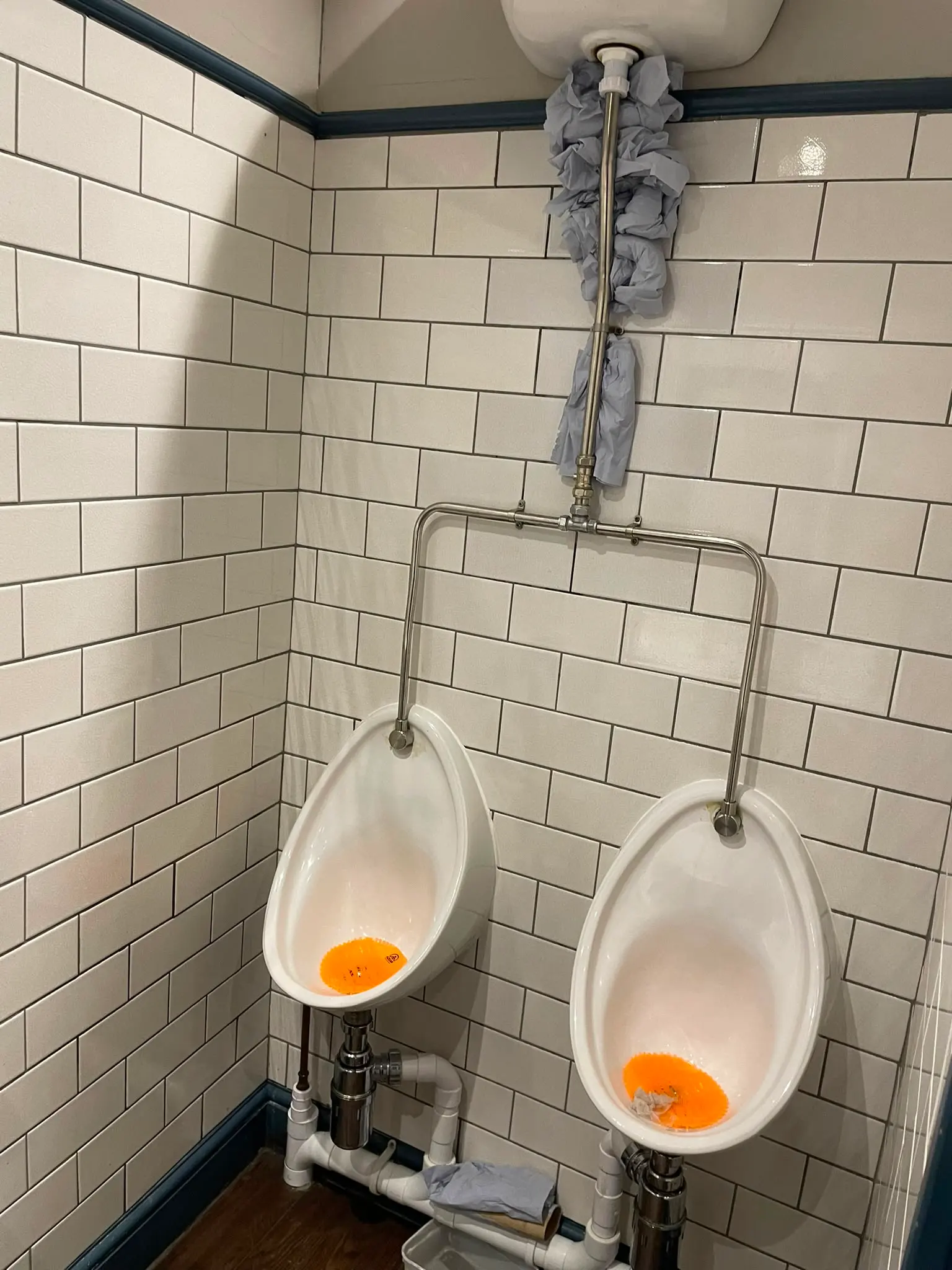 Commercial plumbing leak repair on urinal pipework