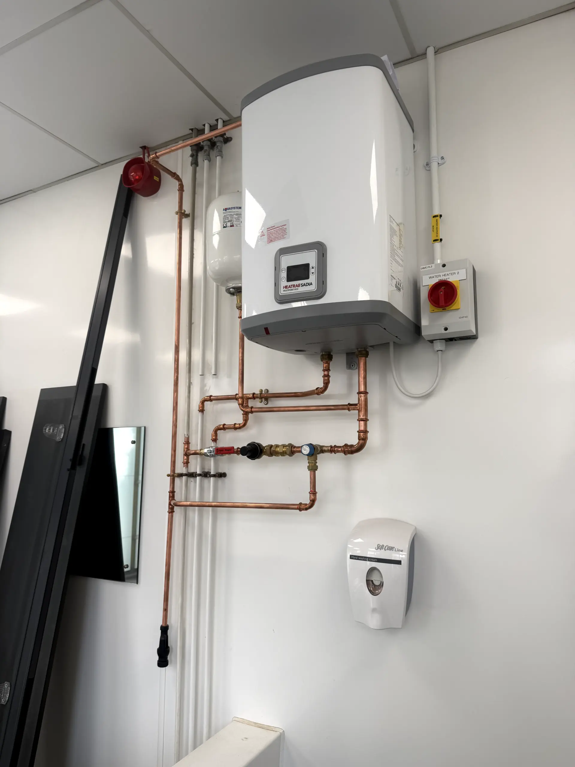 Commercial hot water system installation and professional copper pipework by WGS Services in Darwen