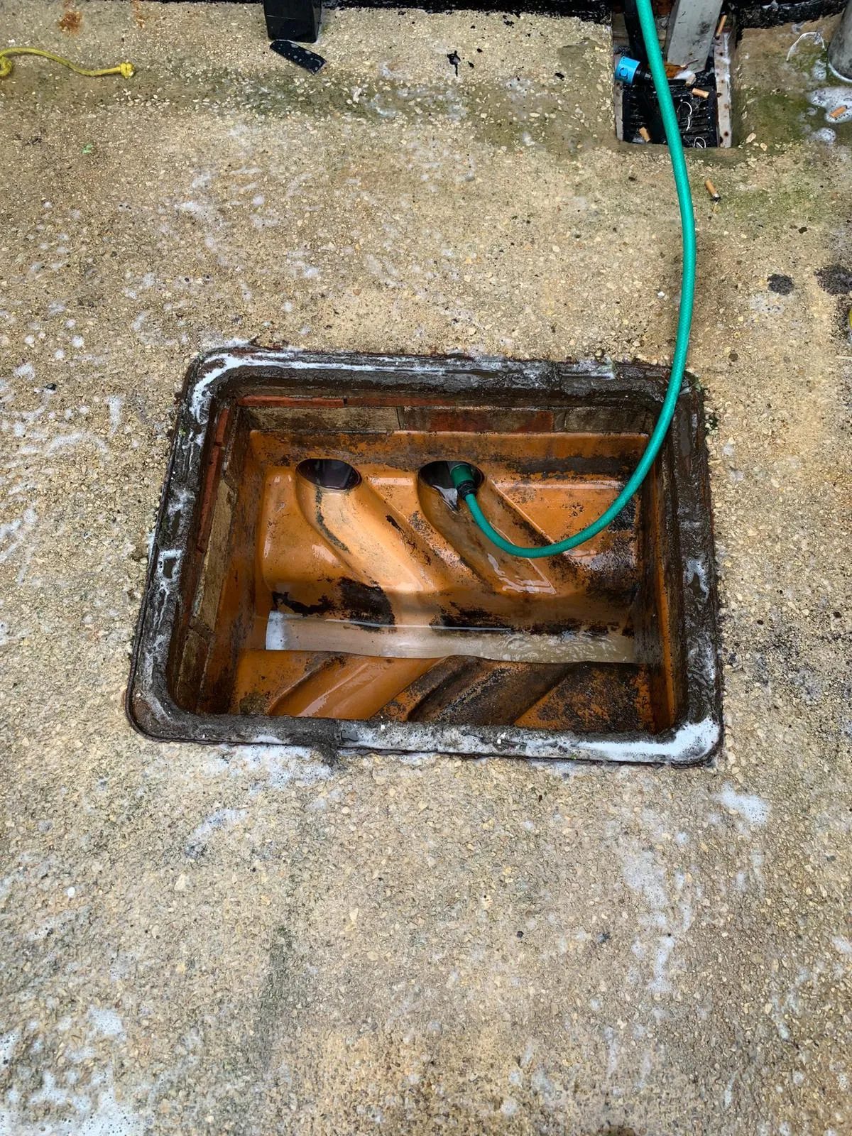 External drain inspection chamber being cleaned in Durham by Clear Drain NE specialists.