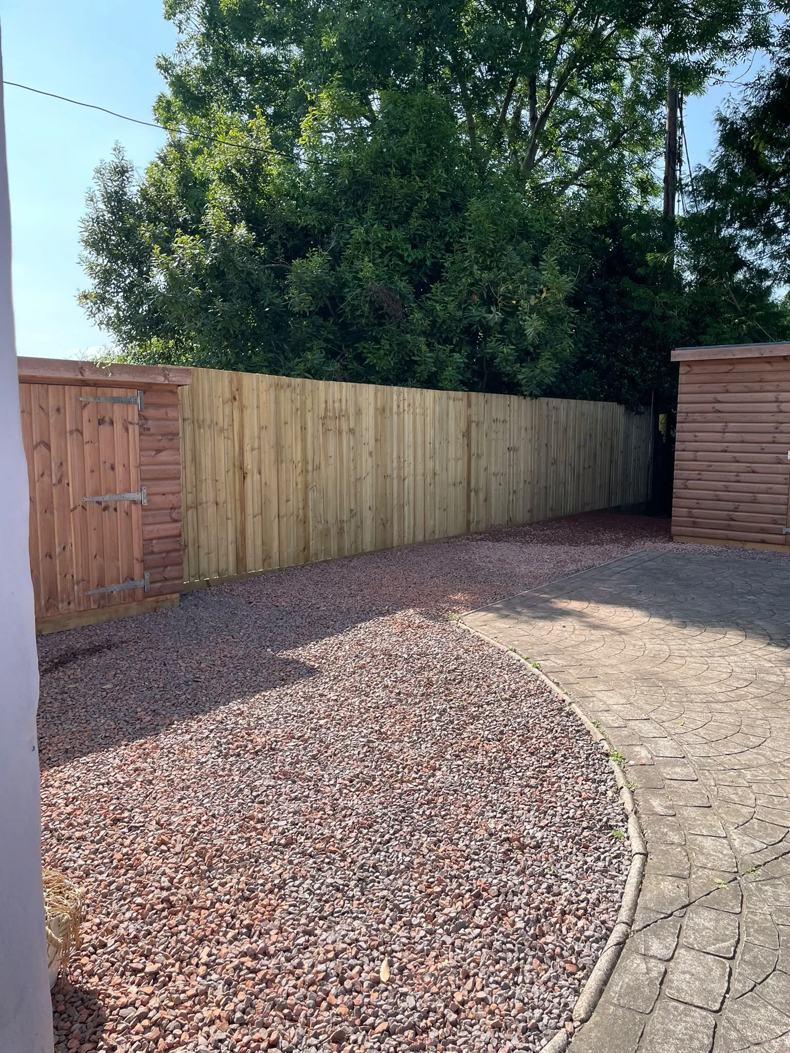 Newly installed timber featheredge fencing and garden boundary installed by JDP Outdoor Solutions