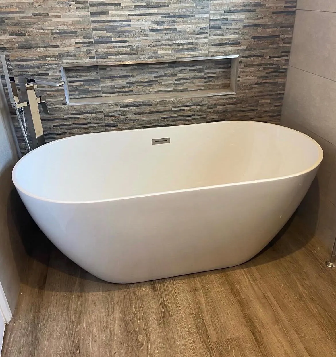 Professional freestanding bathtub installation in York by HM Bathroom and Heating.