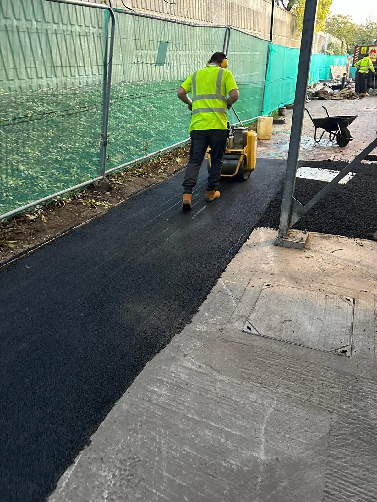 Roberts Drainage Ltd team performing tarmac reinstatement and groundworks in Cambridgeshire.