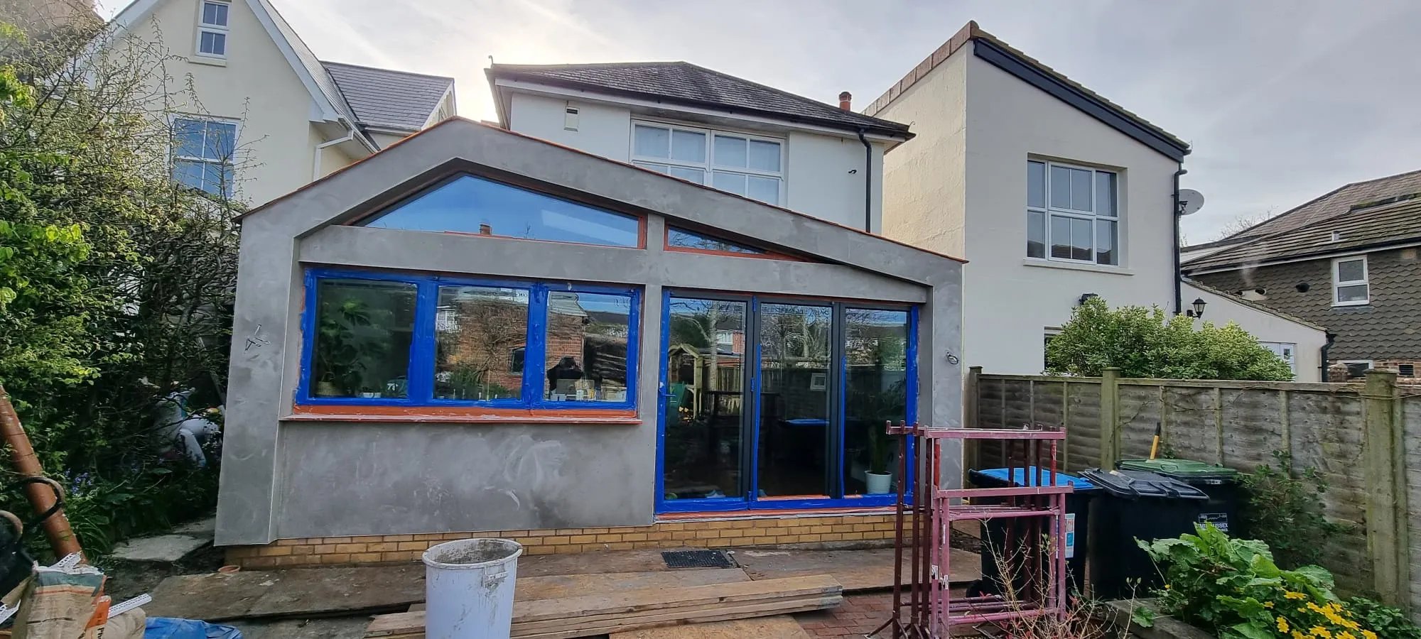 Professional external rendering work in progress on a house extension by Portslade Plastering.