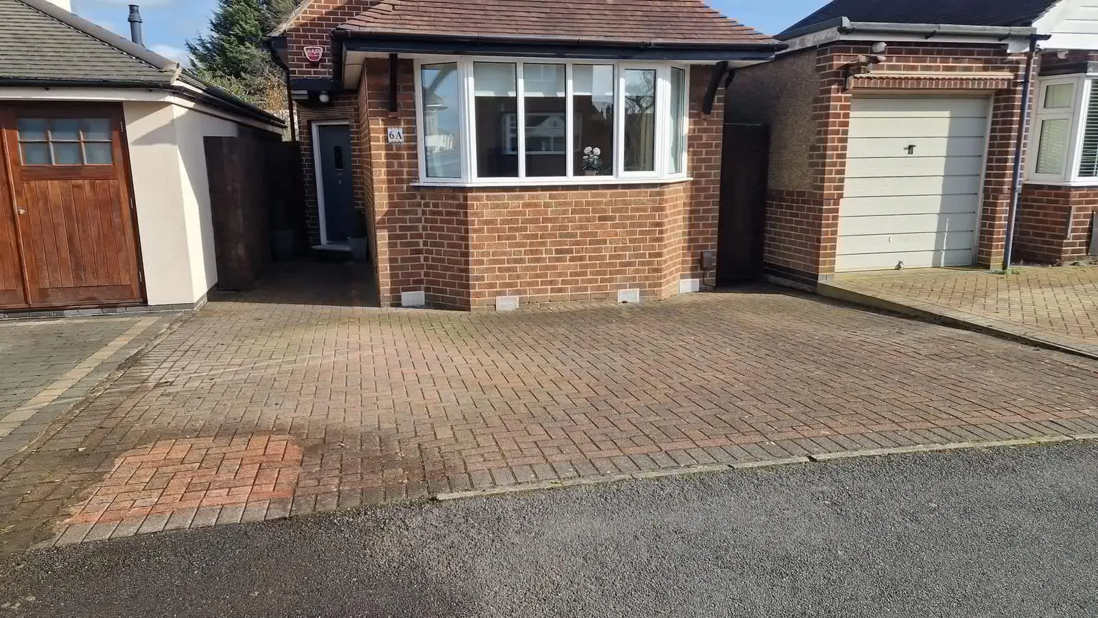 Exterior view of a residential house with a driveway in the Nottingham area.
