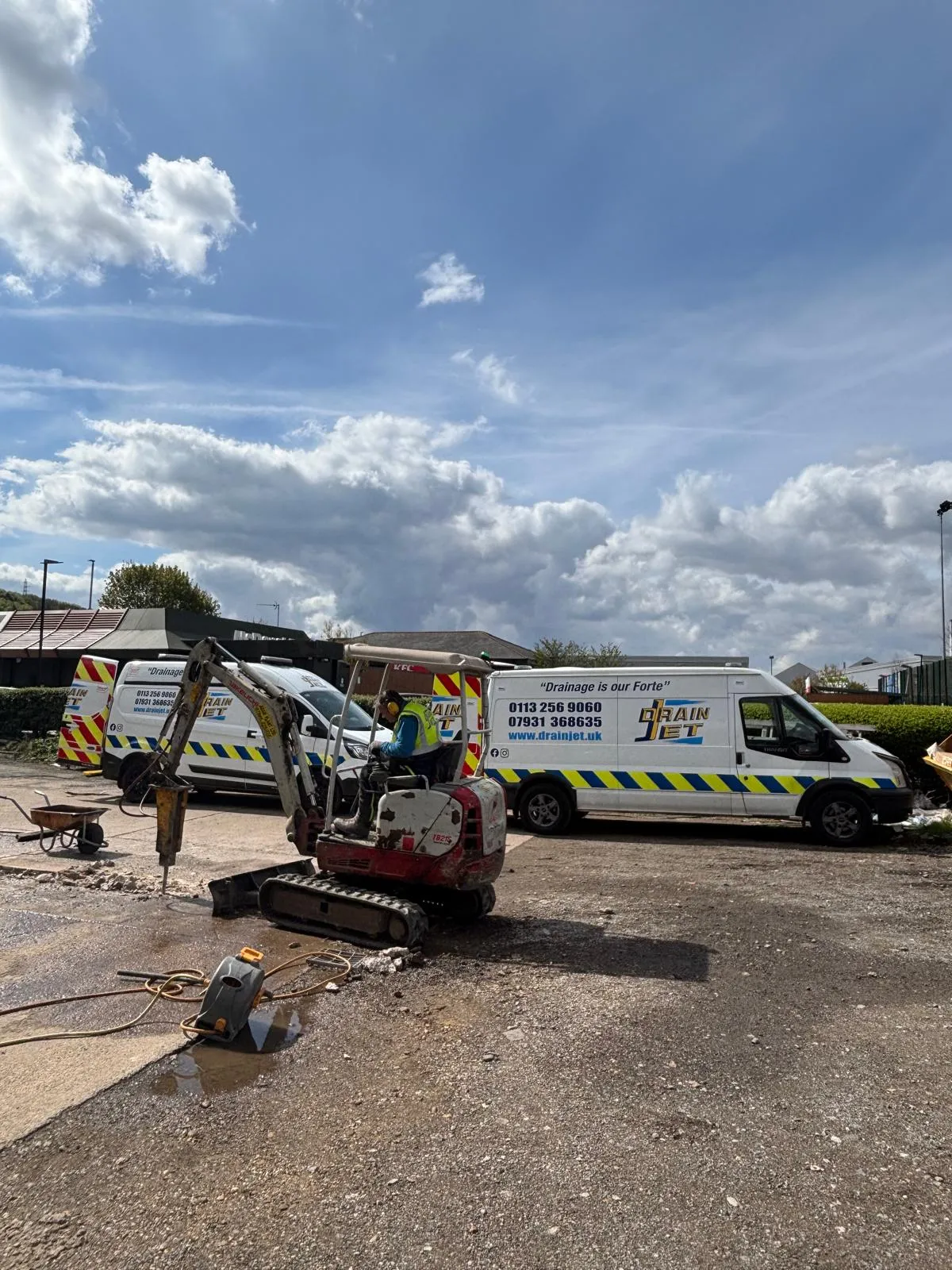 Professional drain repairs and installations in Leeds using a mini digger and breaker.