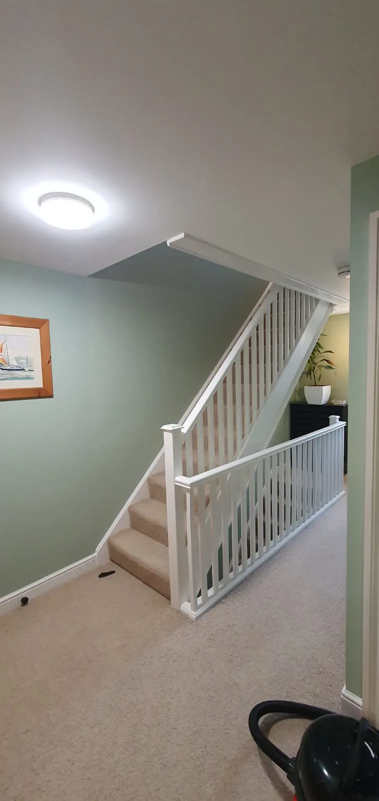 Professional interior painting and decorating of a staircase and landing in Felixstowe