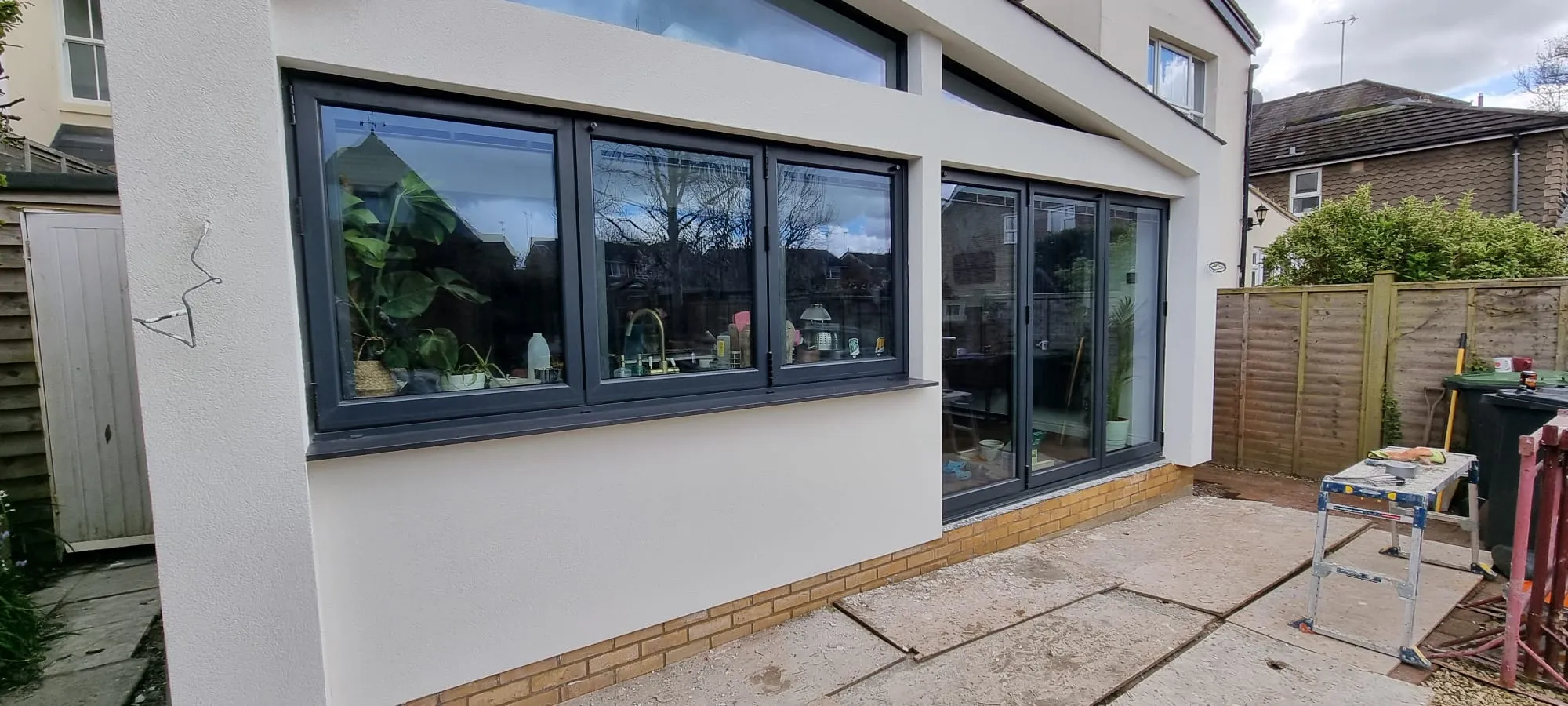 Professional external rendering on a modern home extension in Southwick.