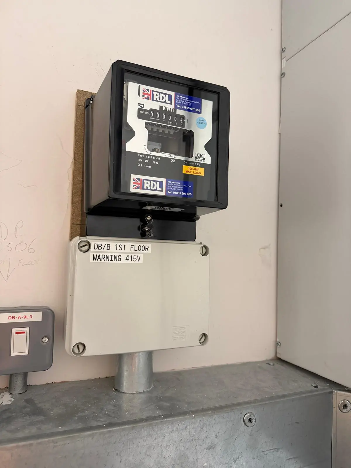 Commercial 3-phase RDL electricity meter and 415V warning junction box installation