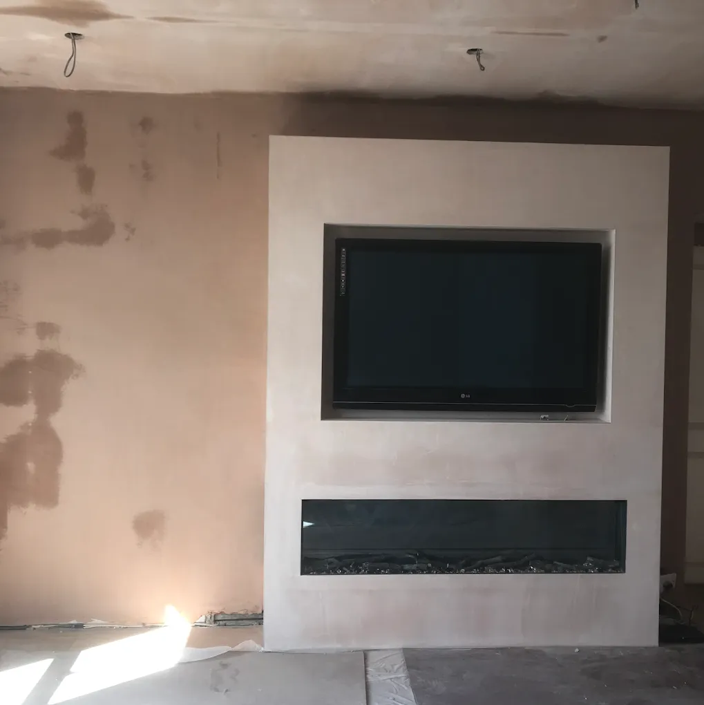 Expert interior plastering and skimming for a bespoke media wall in a Lanark home