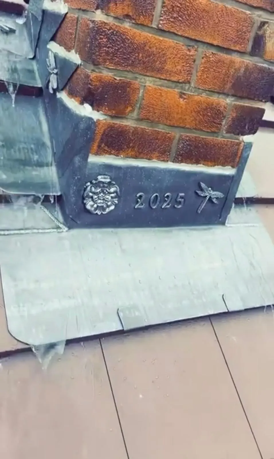 Bespoke decorative lead work on a chimney base in Holmfirth, showcasing expert craftsmanship.