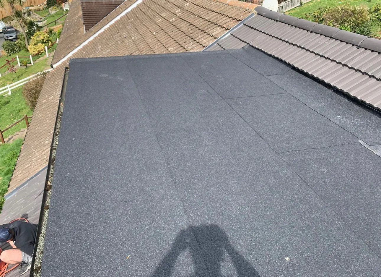 Newly installed felt flat roof by Century Roofing and Building on a home in Kent.