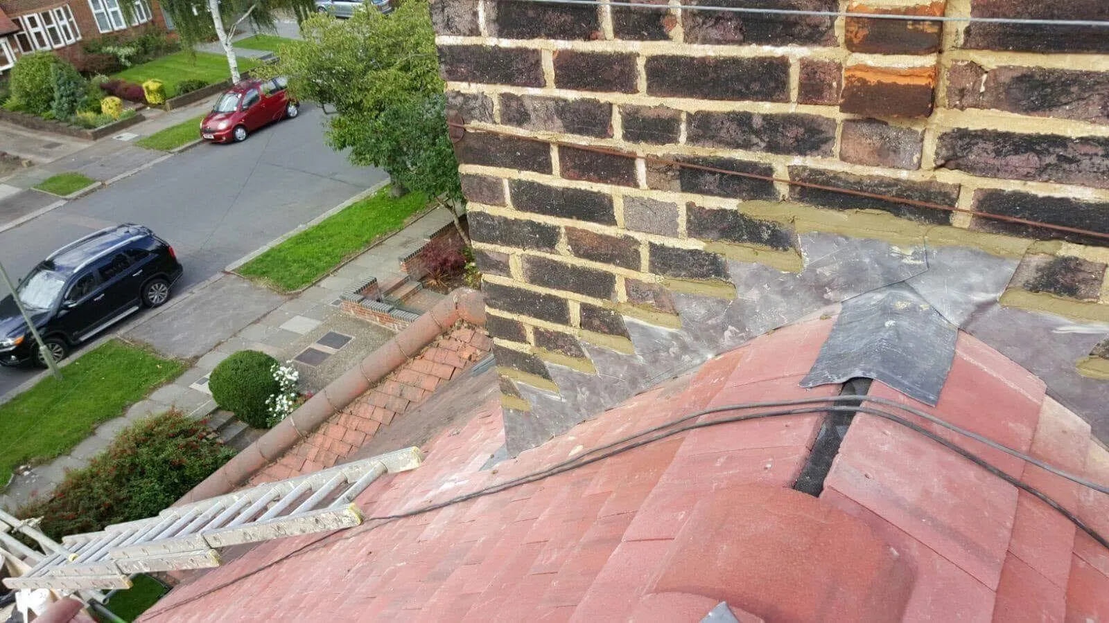 Expert chimney repairs and lead flashing installation by Firmus Roofing & Building in Buckinghamshire.