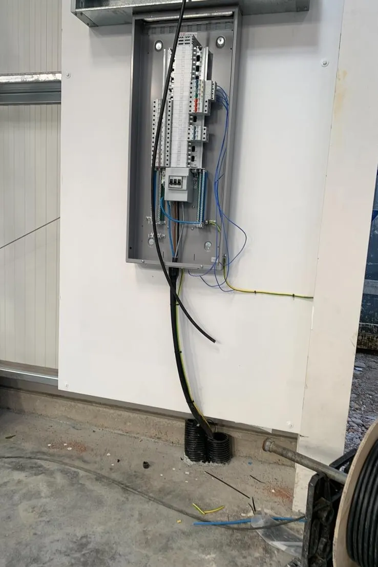 Commercial three-phase distribution board installation with armoured cabling