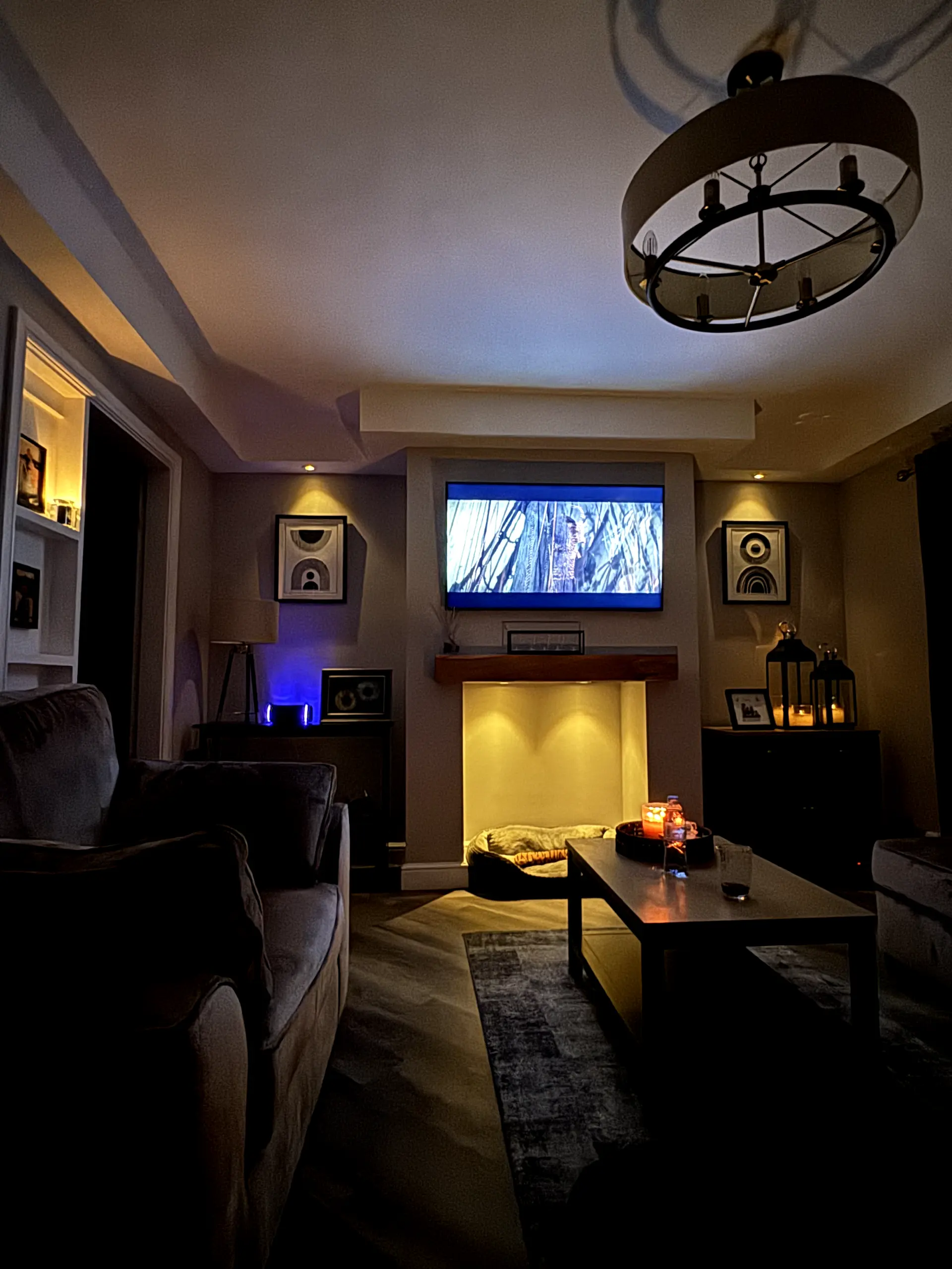 Modern living room in Warrington featuring professional smart lighting installation, mood lighting, and LED spotlight upgrades by JH Electrical Contractors Ltd