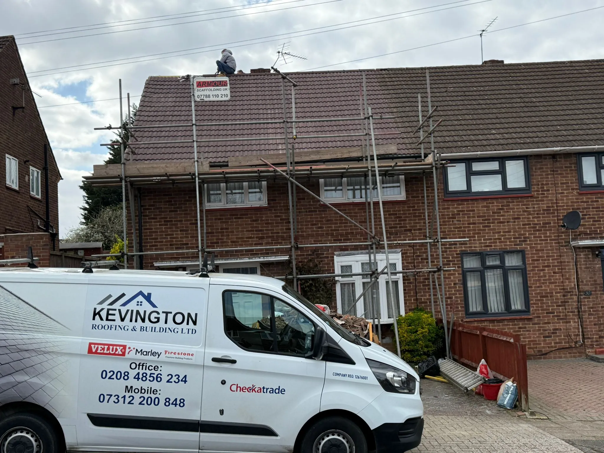 Kevington Roofing and Building LTD van at a residential roofing installation site in South East London