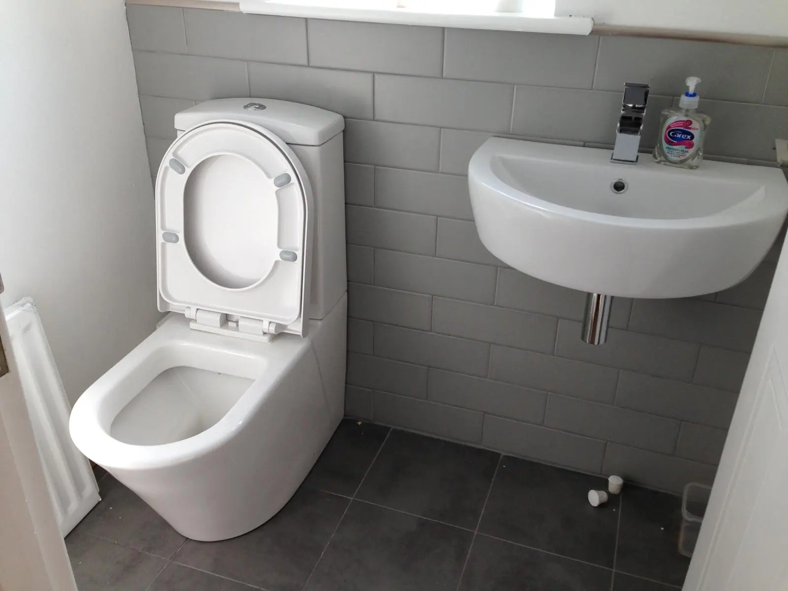 Professional bathroom plumbing and sanitaryware installation in a modern home
